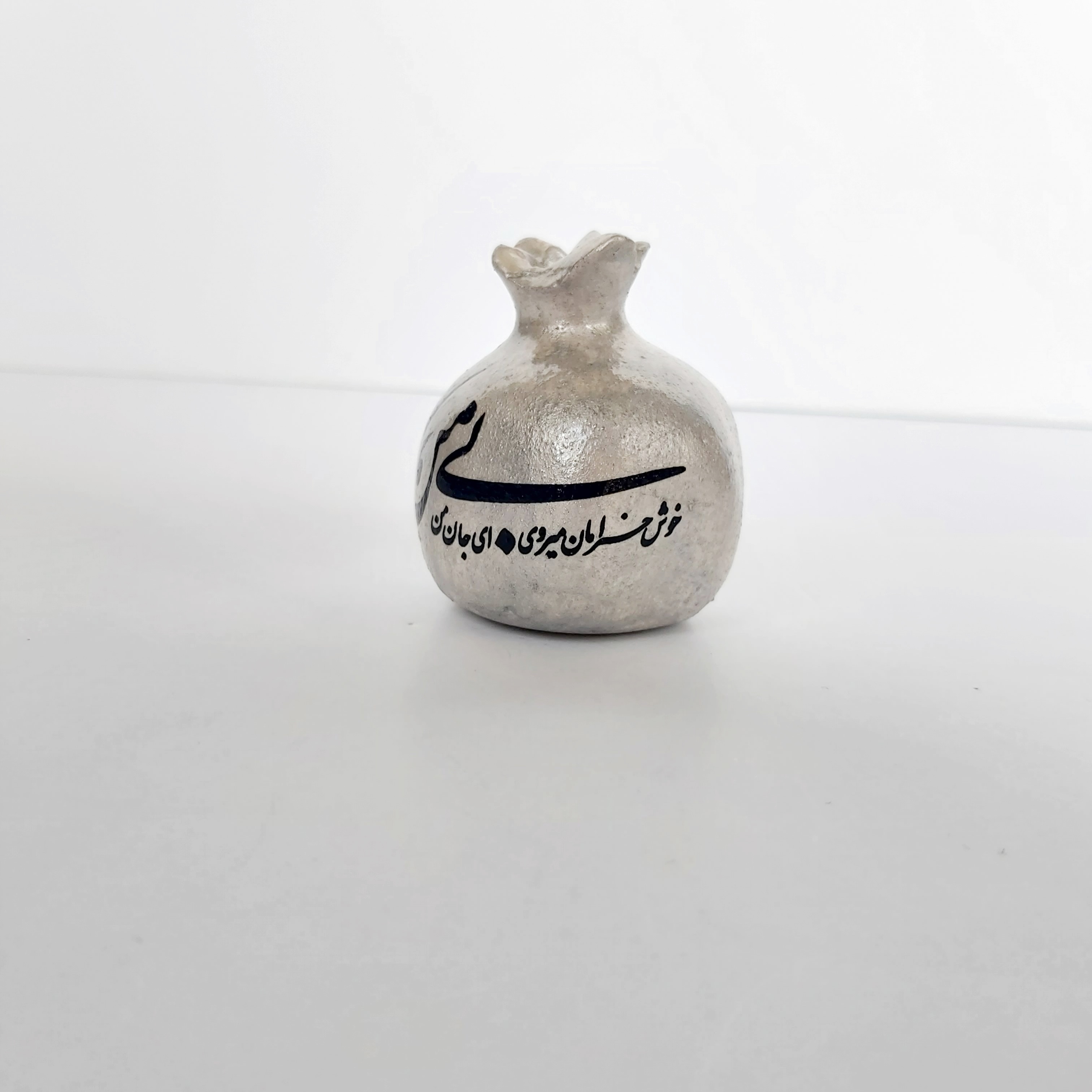 انار تزیینی و شمع