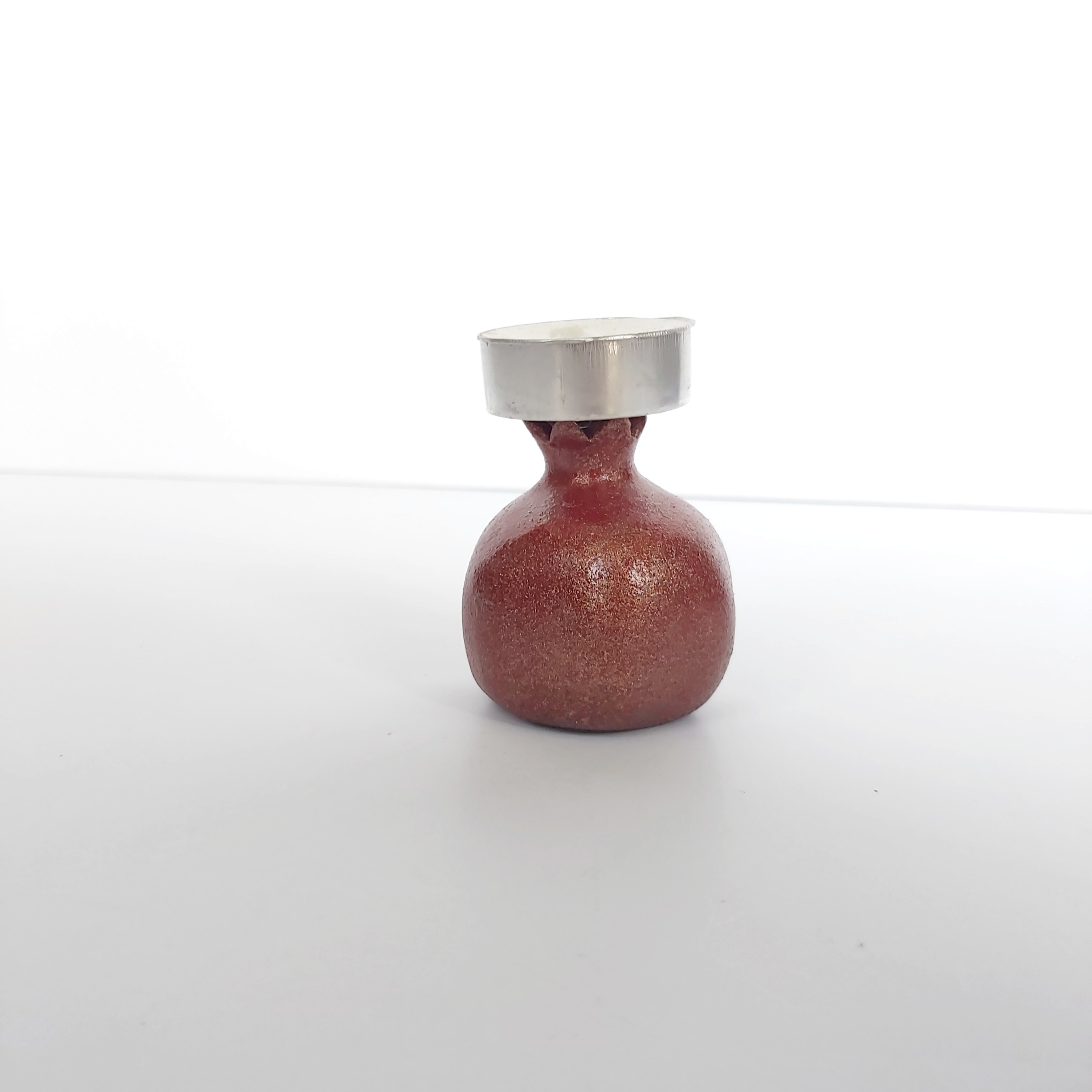 انار تزیینی و شمع